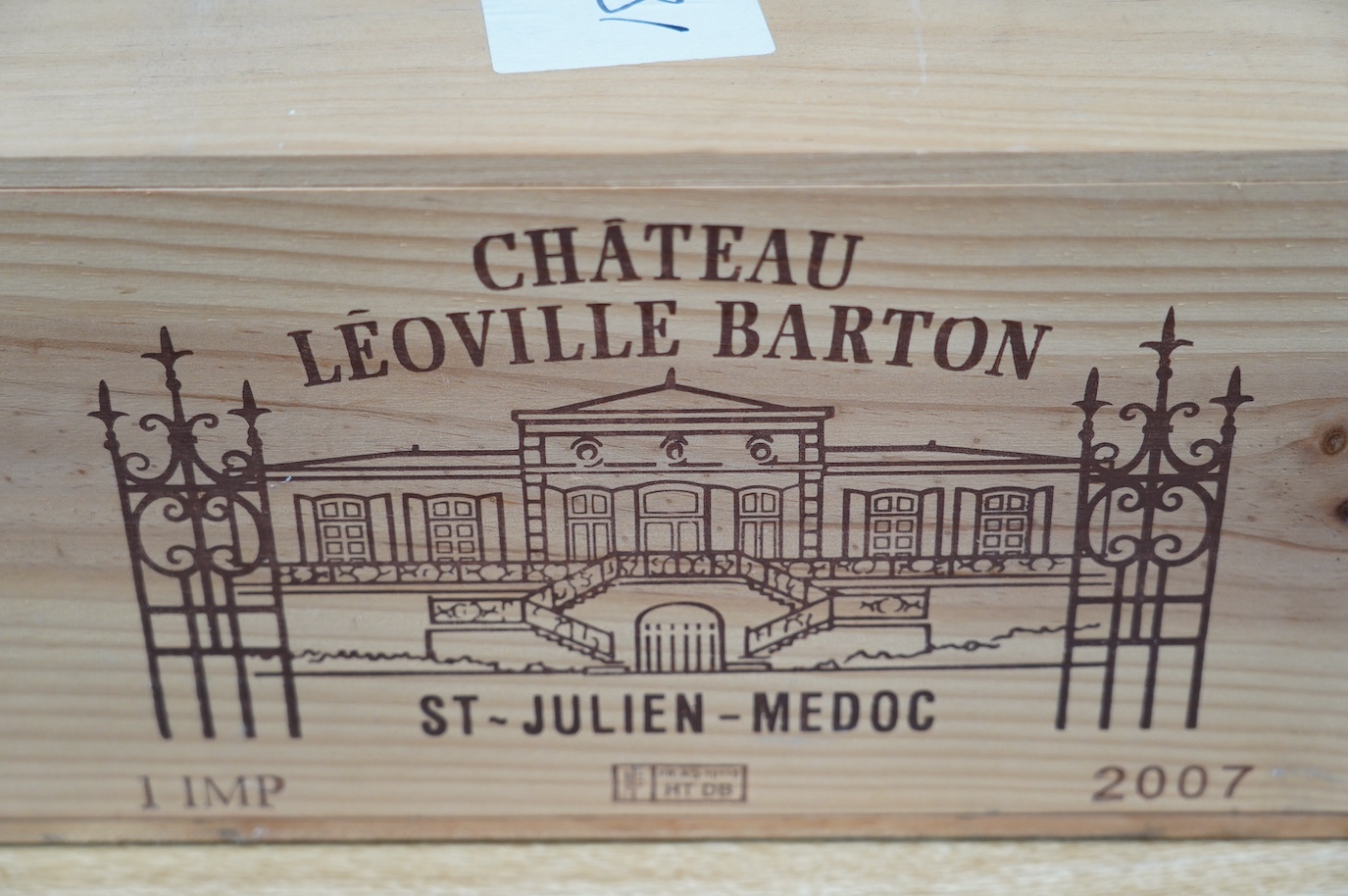 A sealed wood case containing an Imperial bottle of Chateau Leoville Barton 2007. Condition - good